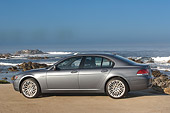 AUT 01 RK0236 01
2006 BMW 760i Gray Profile View On Gravel By Ocean And Rocks