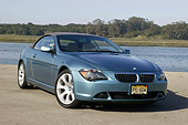 AUT 01 RK0240 01
2004 BMW 645Ci Convertible Blue 3/4 Front View On Pavement By Lake