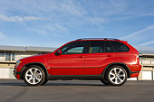 AUT 01 RK0252 01
2006 BMW X5 Red Low Profile Shot On Pavement
