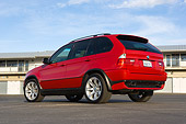 AUT 01 RK0253 01
2006 BMW X5 Red Low 3/4 Rear View On Pavement