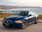 AUT 01 RK0269 01
2006 BMW M6 Coupe Blue 3/4 Front View On Pavement