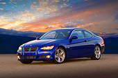 AUT 01 RK0288 01
2007 BMW 335i Coupe Blue 3/4 Front View On Pavement By Hills