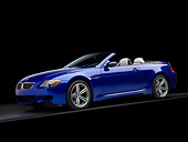 AUT 01 RK0292 02
2007 BMW M6 Convertible Blue 3/4 Side View On Gray Line Studio