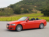 AUT 01 RK0297 01
2007 BMW 328Ci Convertible Red 3/4 Side View On Pavement