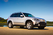 AUT 01 RK0307 01
2007 BMW X5 4.8i Silver Low 3/4 Side View On Pavement By Water