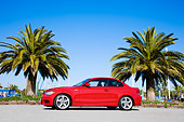 AUT 01 RK0318 01
2008 BMW 135i Red 3/4 Front View By Palm Trees Blue Sky