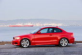 AUT 01 RK0321 01
2008 BMW 135i Red 3/4 Front View By Harbor