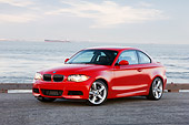 AUT 01 RK0322 01
2008 BMW 135i Red 3/4 Front View By Harbor