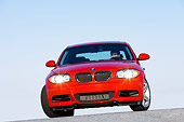 AUT 01 RK0330 01
2008 BMW 135i Red Head On View Blue Sky