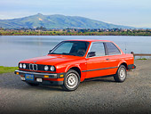 AUT 01 RK0335 01
1984 BMW 318i Red 3/4 Front View On Pavement By Hills And Lake