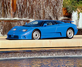AUT 02 RK0008 01
1994 Bugatti EB110 GT Coupe Blue 3/4 Side View By Water Fountain