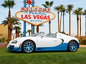 AUT 02 RK0151 01
Bugatti Veyron 18.4 Grand Sport Vitesse SE White And Blue Profile View On Grass By Las Vegas Sign