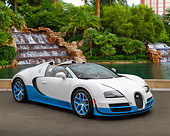 AUT 02 RK0152 01
Bugatti Veyron 16.4 Grand Sport Vitesse SE White And Blue 3/4 Front View On Pavement By Waterfall