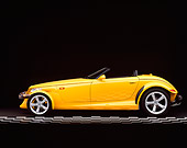 AUT 03 RK0001 02
1999 Plymouth Prowler Roadster Yellow Profile On Checkered Line Studio