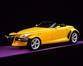 AUT 03 RK0006 01
1999 Plymouth Prowler Roadster Yellow Side 3/4 View On Purple Floor Studio