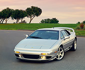 AUT 04 RK0047 01
1999 Lotus Esprit V8 Silver Front 3/4 View On Pavement By Trees At Dusk