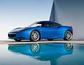 AUT 04 RK0180 01
2013 Lotus Evora Blue 3/4 Side View Reflected In Water