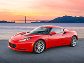 AUT 04 RK0183 01
2013 Lotus Evora Red 3/4 Front View On Pavement By Bay And Bridge At Sunset