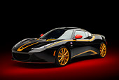 AUT 04 RK0194 01
2012 Lotus Evora S GP Edition Black And Gold 3/4 Front View In Studio