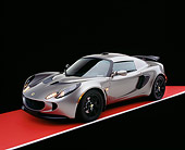 AUT 04 RK0147 03
2006 Lotus Exige Silver 3/4 Front View Shot On Gray Line Red Floor Studio