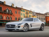 AUT 05 BK0004 01
2011 Mercedes-Benz SLS AMG Silver 3/4 Front View On Pavement By Buildings