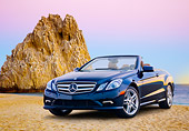 AUT 05 BK0008 01
2011 Mercedes-Benz E550 Cabriolet Blue 3/4 Front View On Beach