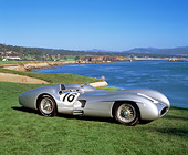 AUT 05 RK0212 02
1954 Mercedes W196 Race Car Silver 3/4 Side View On Grass By Water
