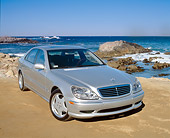 AUT 05 RK0253 06
2002 Mercedes-Benz S500 Class Silver 3/4 Front View On Sand By The Ocean