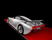AUT 05 RK0335 09
1991 Mercedes Lotec C1000 Silver Slanted 3/4 Rear View On Red Floor Studio