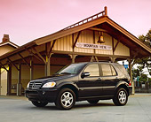AUT 05 RK0350 05
2003 Mercedes ML500 Black Low 3/4 Side View On Pavement By Train Depot