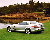 AUT 05 RK0371 01
2005 Mercedes-Benz SLR McLaren Silver 3/4 Rear View On Grass By Water Filtered