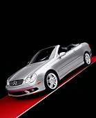AUT 05 RK0387 04
2005 Mercedes-Benz CLK55 Convertible Silver Slanted Front 3/4 View On Red Floor Gray Line Studio