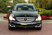 AUT 05 RK0450 01
2006 Mercedes-Benz R500 Black Head On Shot On Pavement By Flowers