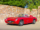 AUT 05 RK0585 01
1955 Mercedes-Benz 300 SLR Red 3/4 Front View On Pavement By Stone Wall