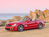 AUT 05 RK0614 01
2010 Mercedes-Benz SL63 Convertible Red 3/4 Side View On Beach
