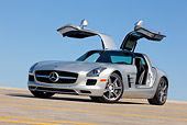 AUT 05 RK0658 01
2011 Mercedes-Benz SLS AMG Silver 3/4 Front View On Roof Of Parking Garage