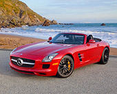 AUT 05 RK0675 01
2012 Mercedes-Benz SLS Roadster Red 3/4 Front View On Pavement By Beach