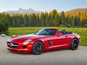 AUT 05 RK0679 01
2012 Mercedes-Benz SLS Roadster Red 3/4 Side View On Pavement By Meadow And Trees