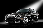 AUT 05 IZ0006 01
2009 Mercedes-Benz E63 Black 3/4 Front View Studio