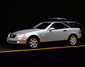 AUT 05 RK0058 06
1998 Mercedes-Benz SLK Kompressor Convertible Silver 3/4 Side View On Yellow Line Studio