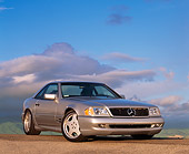 AUT 05 RK0075 06
1997 Mercedes-Benz 500SL Sport Silver 3/4 Front View Blue Sky Gray Clouds