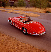 AUT 05 RK0150 02
Mercedes-Benz 300SL Convertible Red Overhead 3/4 Rear View On Pavement