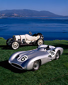 AUT 05 RK0211 02
1954 And 1908 Mercedes-Benz Race Cars On Grass By Water