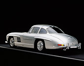 AUT 05 RK0236 08
1955 Mercedes-Benz 300SL Gullwing Silver 3/4 Rear View On Gray Line Studio