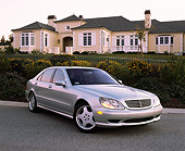 AUT 05 RK0261 05
2002 Mercedes-Benz S500 Class Silver 3/4 Front View On Pavement By House