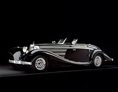 AUT 05 RK0343 11
1937 Mercedes-Benz 540K Special Roadster Black 3/4 Side View On Gray Line Studio