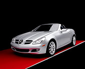 AUT 05 RK0390 02
2005 Mercedes-Benz SLK350 Convertible Silver 3/4 Front View On Red Floor Studio