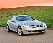 AUT 05 RK0401 04
2005 Mercedes-Benz SLK350 Convertible Silver 3/4 Front View On Pavement By Grass Hills Filtered