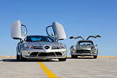 AUT 05 RK0443 01
Mercedes-Benz 2005 SLR McLaren Silver 1956 300SL Doors Open On Pavement