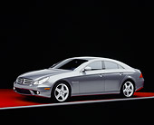 AUT 05 RK0470 01
2006 Mercedes-Benz CLS55 AMG Gray 3/4 Side View On Red Floor Studio